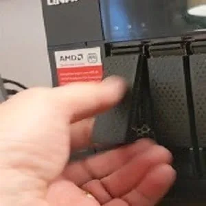 Remove qnap nas drive by first pulling lever Remove qnap nas drive by first pulling lever